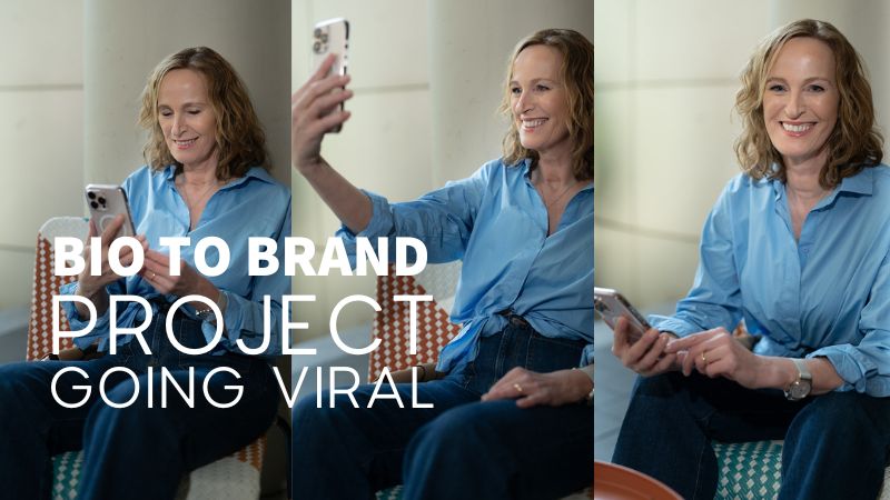 Businessfrau erstellt Social Media Content mit Smartphone und steht für strategisches Personal Branding und virales Marketing